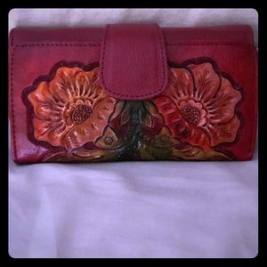 Hand chiseled leather wallet